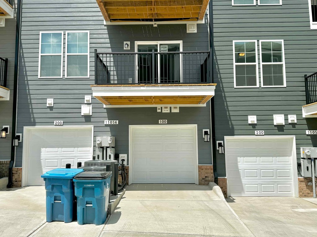 new garage doors installed on the side of a house