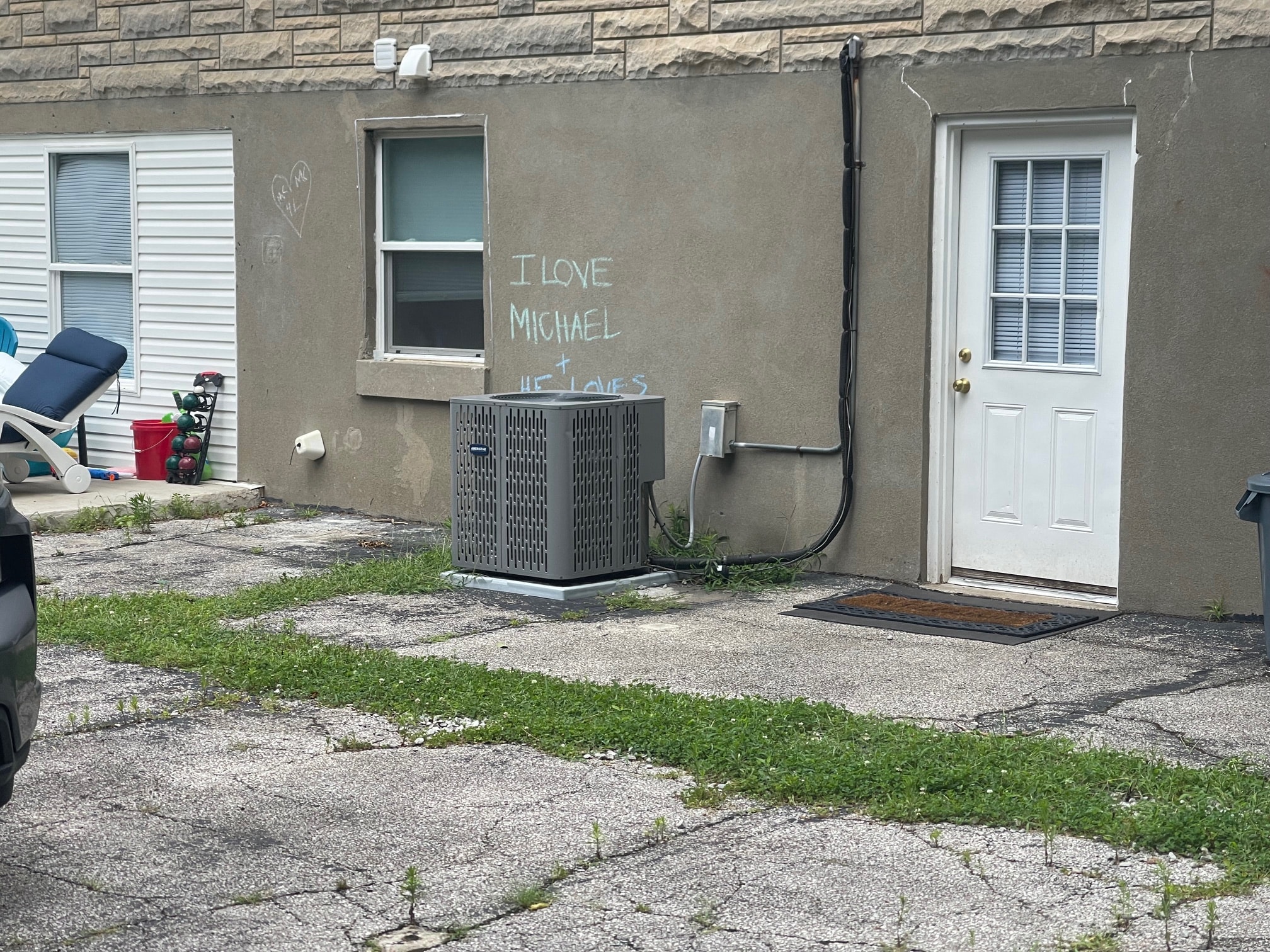A wall with the words "I love Michael" painted on it.