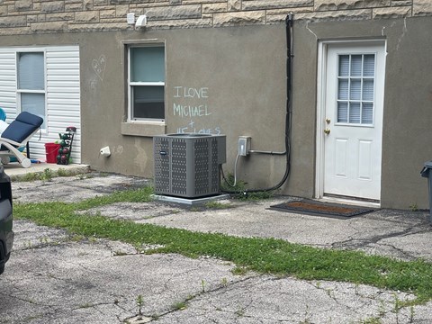 A wall with the words "I love Michael" painted on it.
