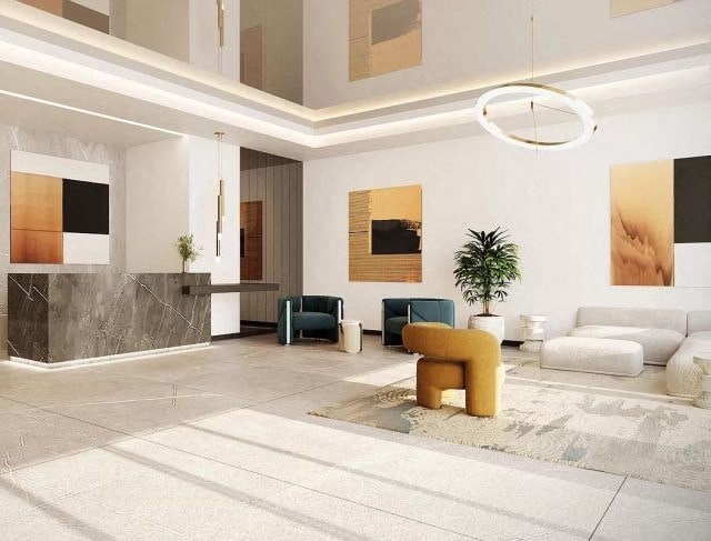 a living room with a couch and a chair