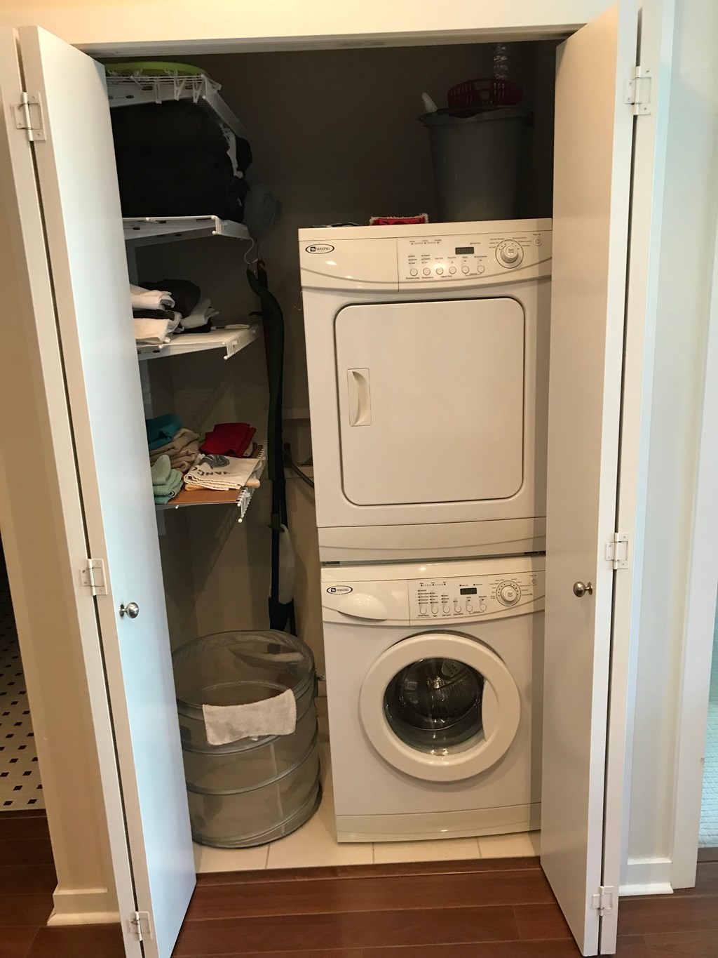 a front loading washer and dryer in a closet