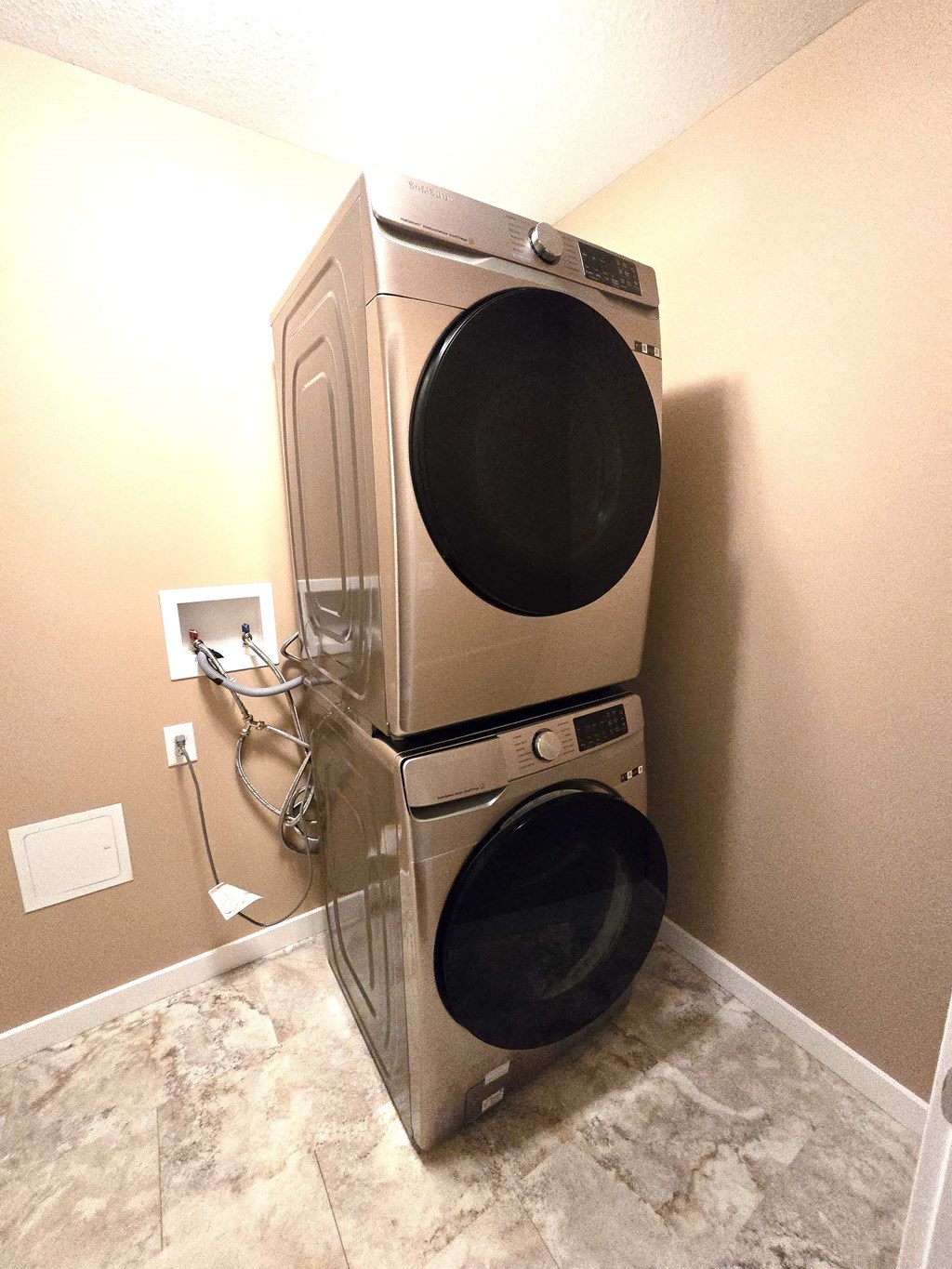 a washing machine and dryer in a laundry room