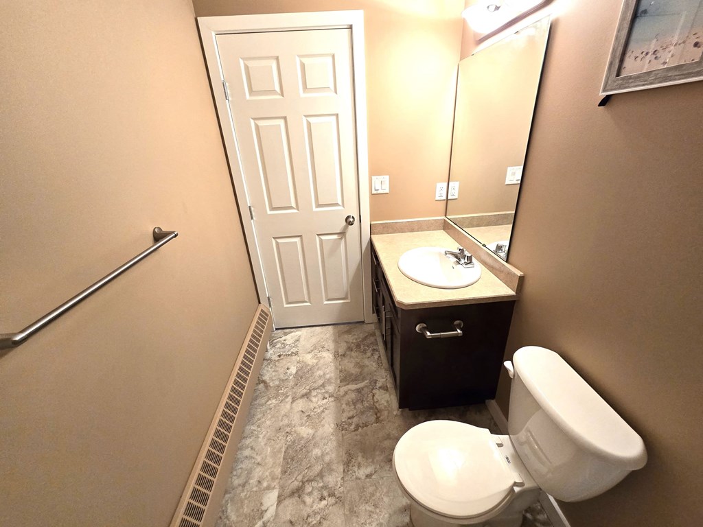 a small bathroom with a toilet and a sink