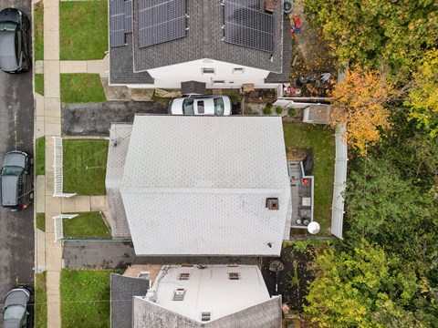an aerial view of a roof with solar panels on it