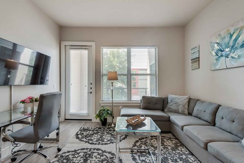 a living room with a couch and a coffee table