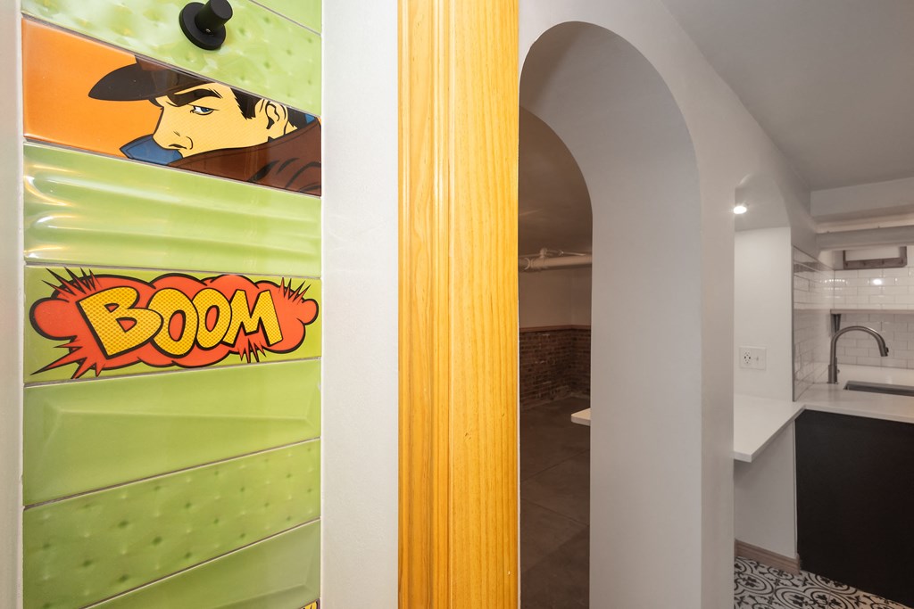 a door with a comic book on it in a room