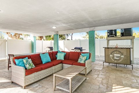 a living room with a couch and a table