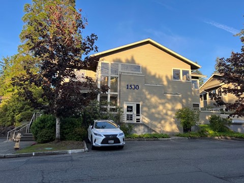a car parked in front of a house