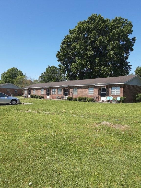 a house with a car parked in front of it