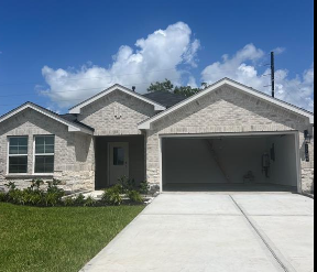 a white brick house with a garage door