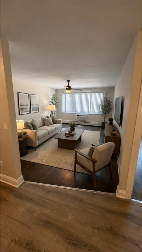 A living room with a couch, chair, and a coffee table.