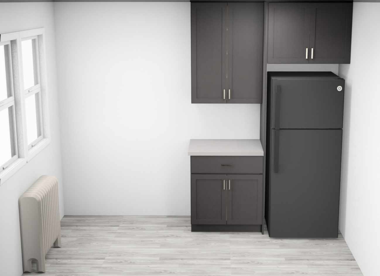 A kitchen with a refrigerator, a bench, and cabinets.