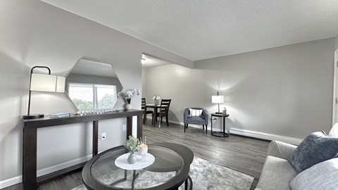 the view of a kitchen and dining area with a table and chairs