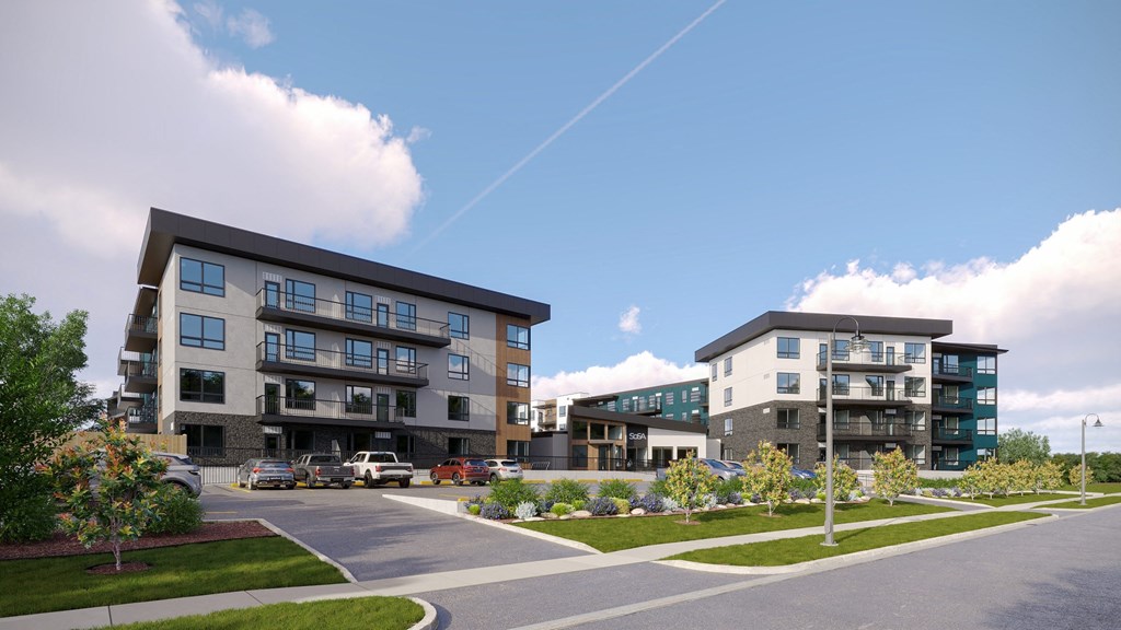 a rendering of an apartment complex on a city street