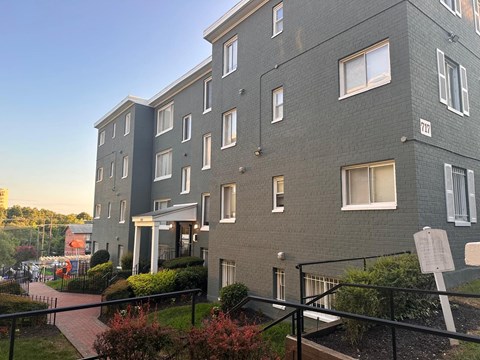 a view of a building with stairs in front of it