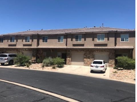 a building with a car parked in front of it