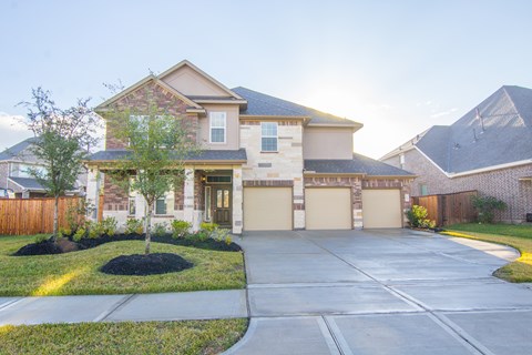 a house with a driveway in front of it