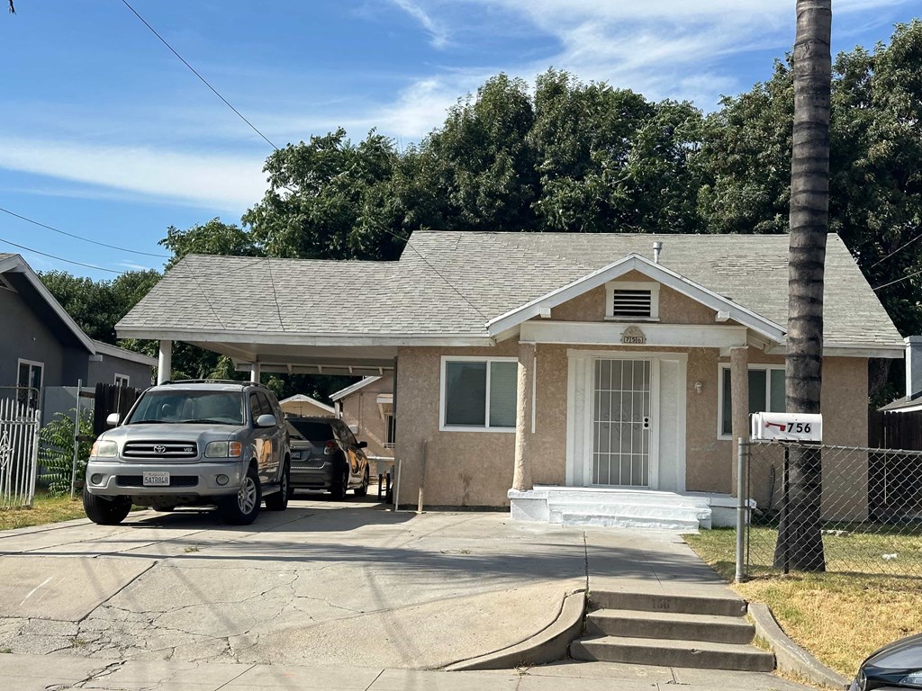 a house with a van parked outside of it