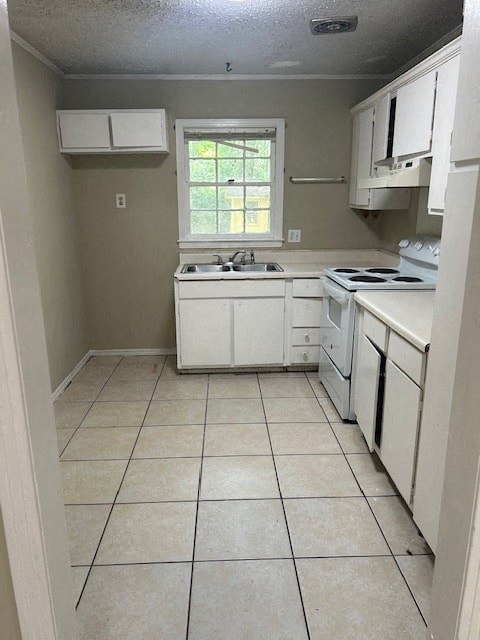 an empty kitchen with white appliances and a window