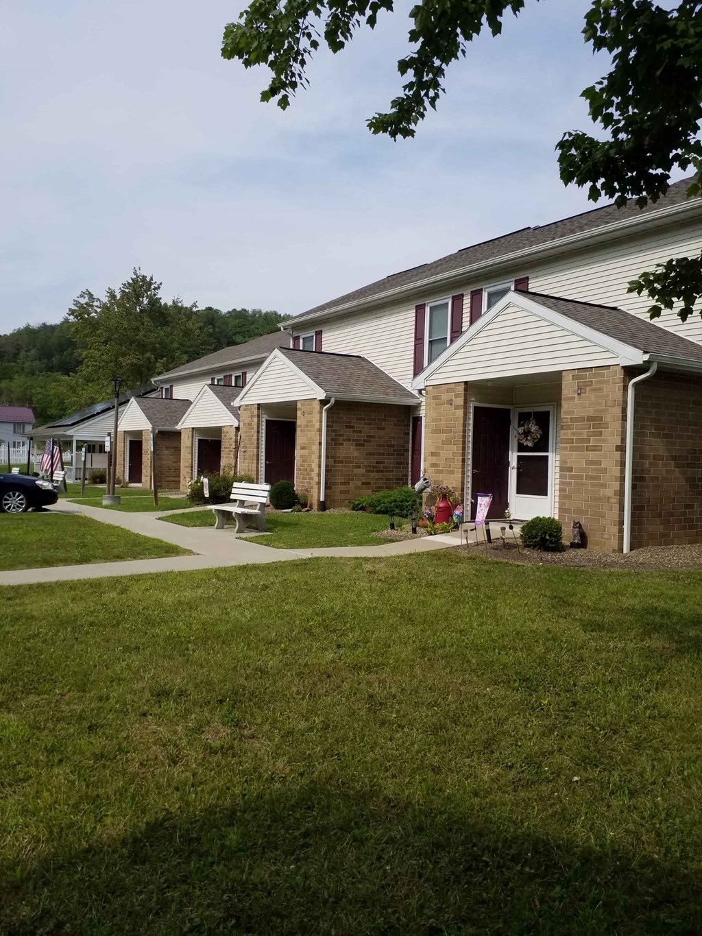 a row of houses on the side of a street