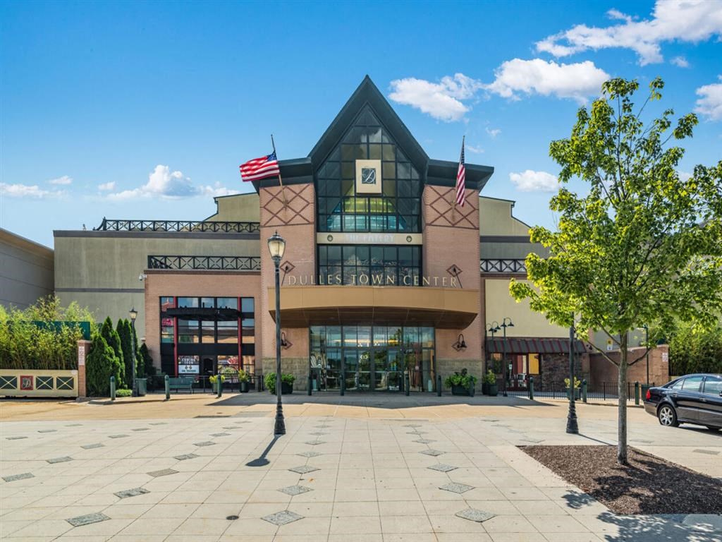 a building with two flags in front of it