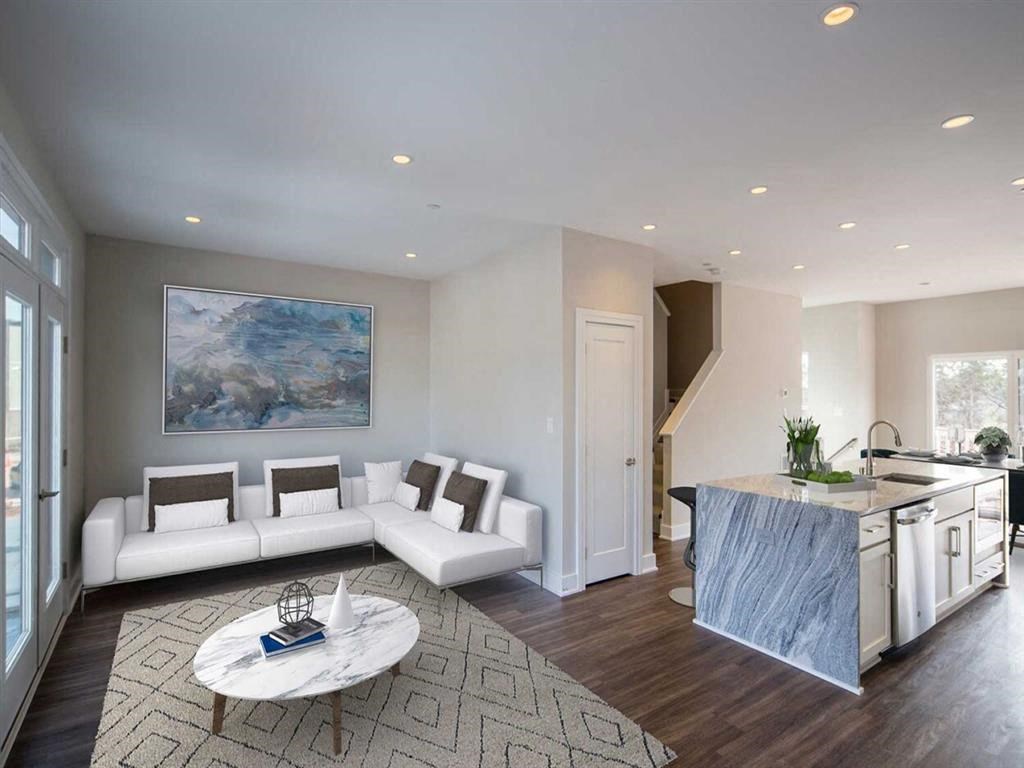 a living room with a couch and a table