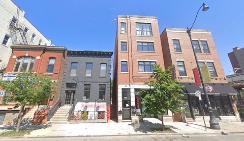 a group of buildings on a city street