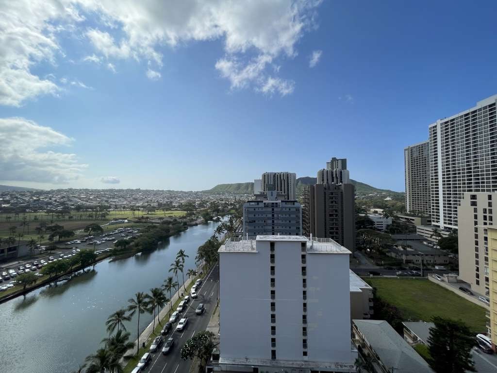 A cityscape with a river running through it.