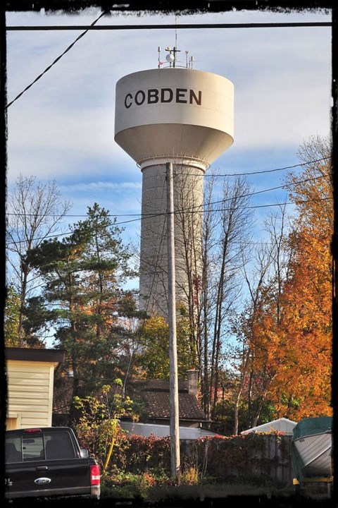 a water tower with the word on it