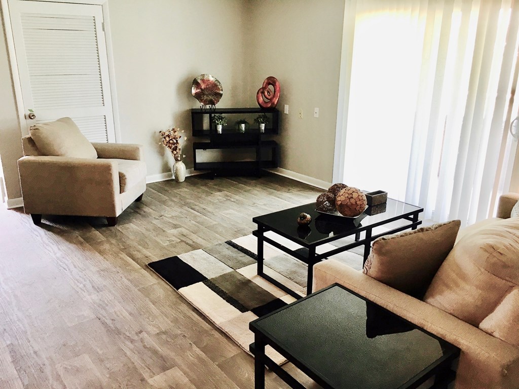 a living room with a couch and a table