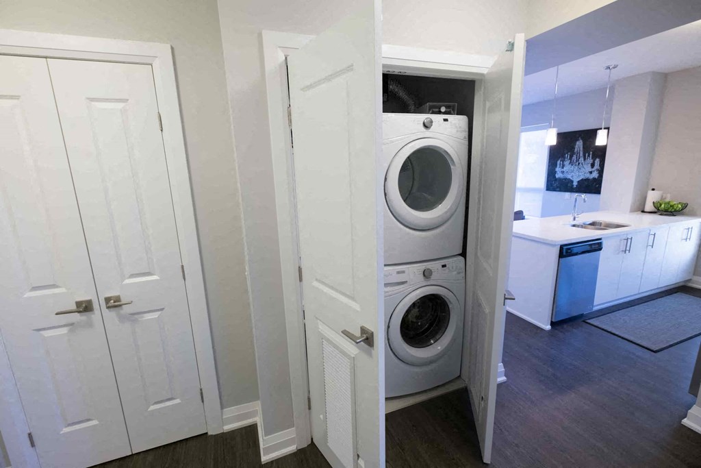 a small laundry room with a washer and dryer in it