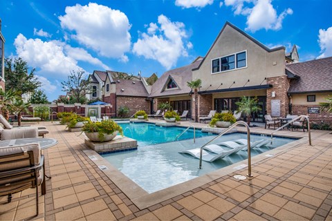 Resort style pool with lounge seating