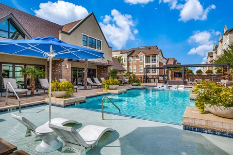 Resort style pool with lounge seating