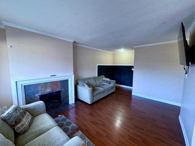 a living room with a couch and a fireplace