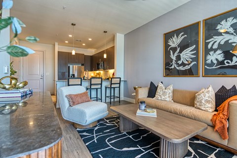 a living room with a couch and a table