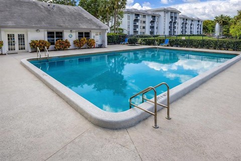 A small pool with a metal ladder.