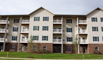 Exterior of Heritage Place, tall white and brick building - Photo Gallery 2