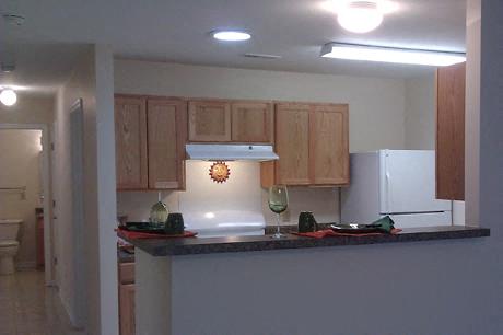 Kitchen, wooden cabinets, white appliances, kitchen island