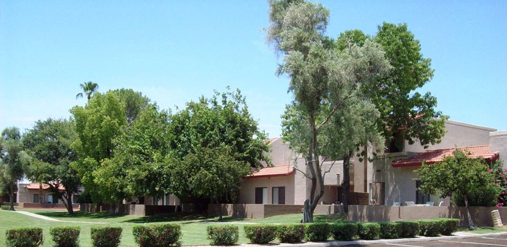 a building with trees in front of it