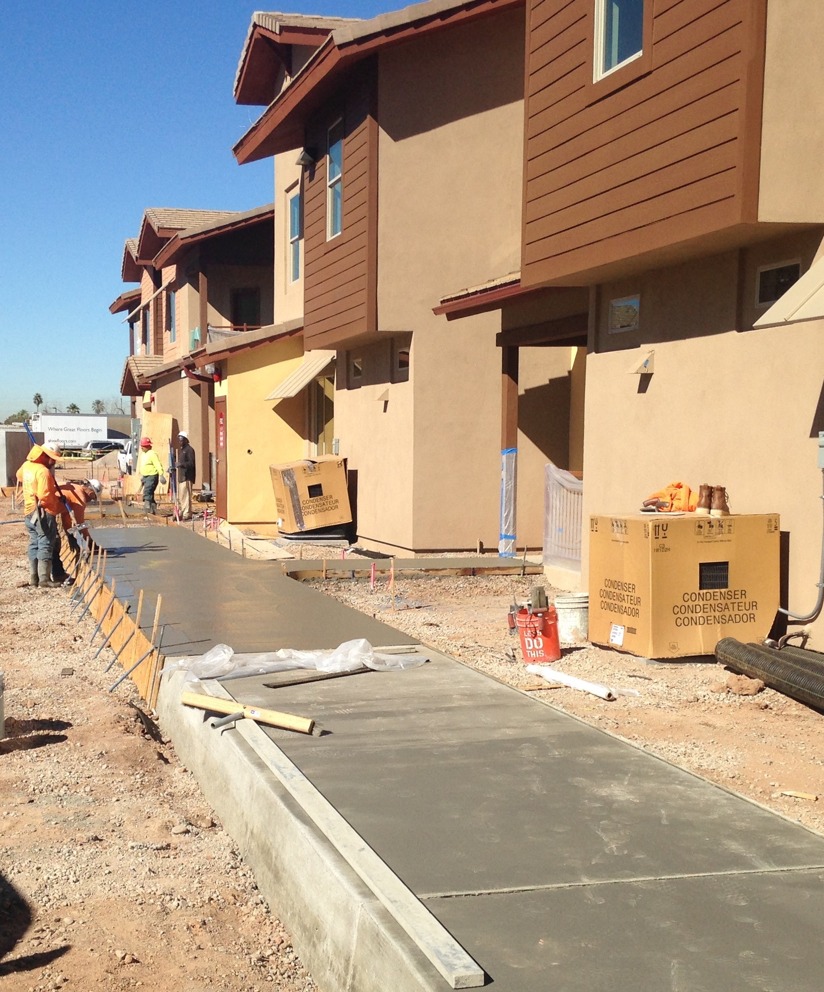 a new driveway is being installed in front of a house