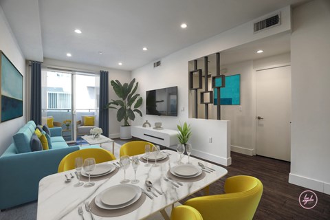 A modern dining room with a white table set for six.