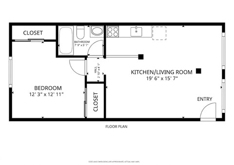 A floor plan of a small apartment with a bedroom, bathroom, kitchen/living room, and closet.