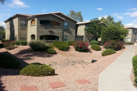 a house with a garden in front of it