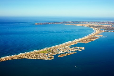an aerial view of the beach and the ocean
