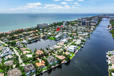 a city from the sky with a body of water