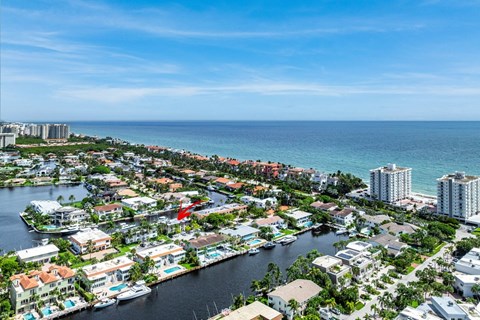 an aerial view of the city and the ocean