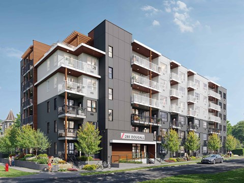 Apartment building 285 Dougall with balconies and trees in front.
