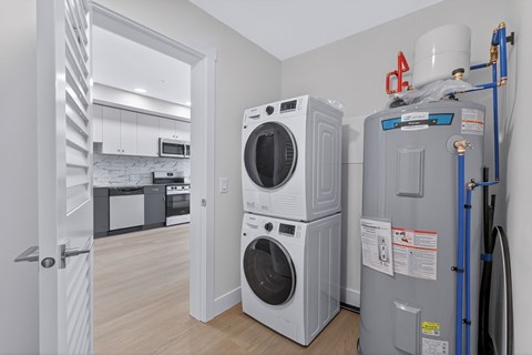 A laundry room with a washer and dryer.