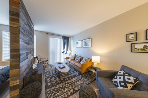 a living room with a couch and a table