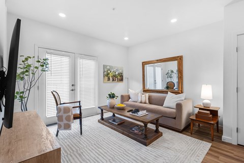 a living room with a couch and a coffee table